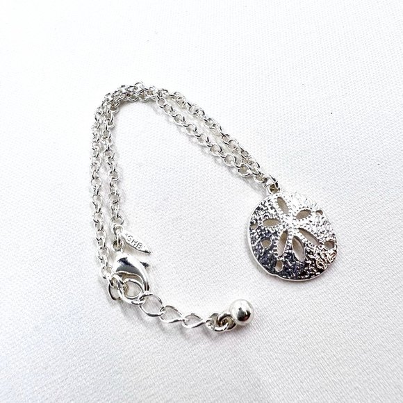 SHB Avon Jewelry - SHB Avon - Sand Dollar Charm Shiny Silver Tone 7” Bracelet